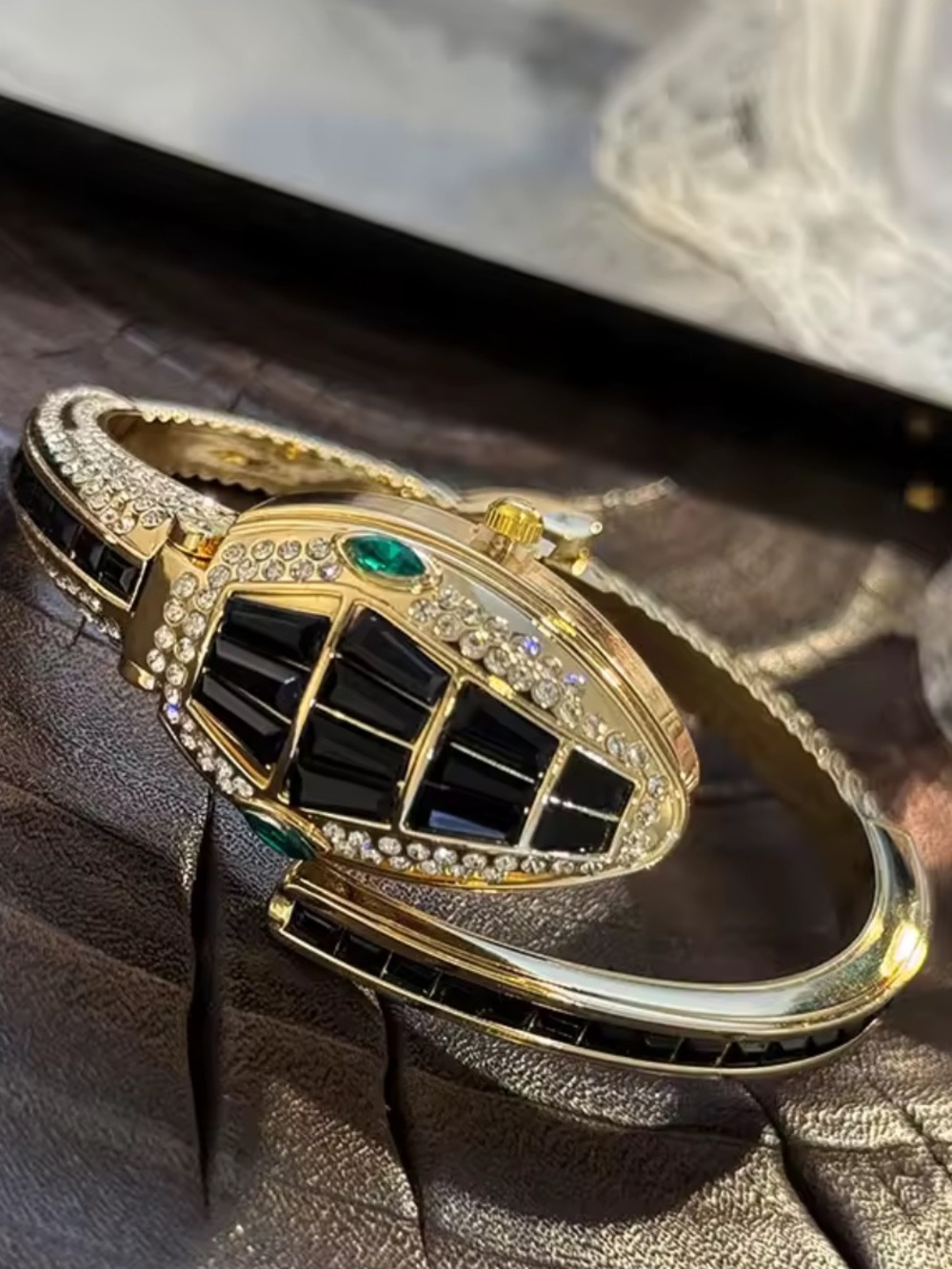 Gold and Black Pavé Serpent Bracelet with Green Accent — Women Jewelry watch